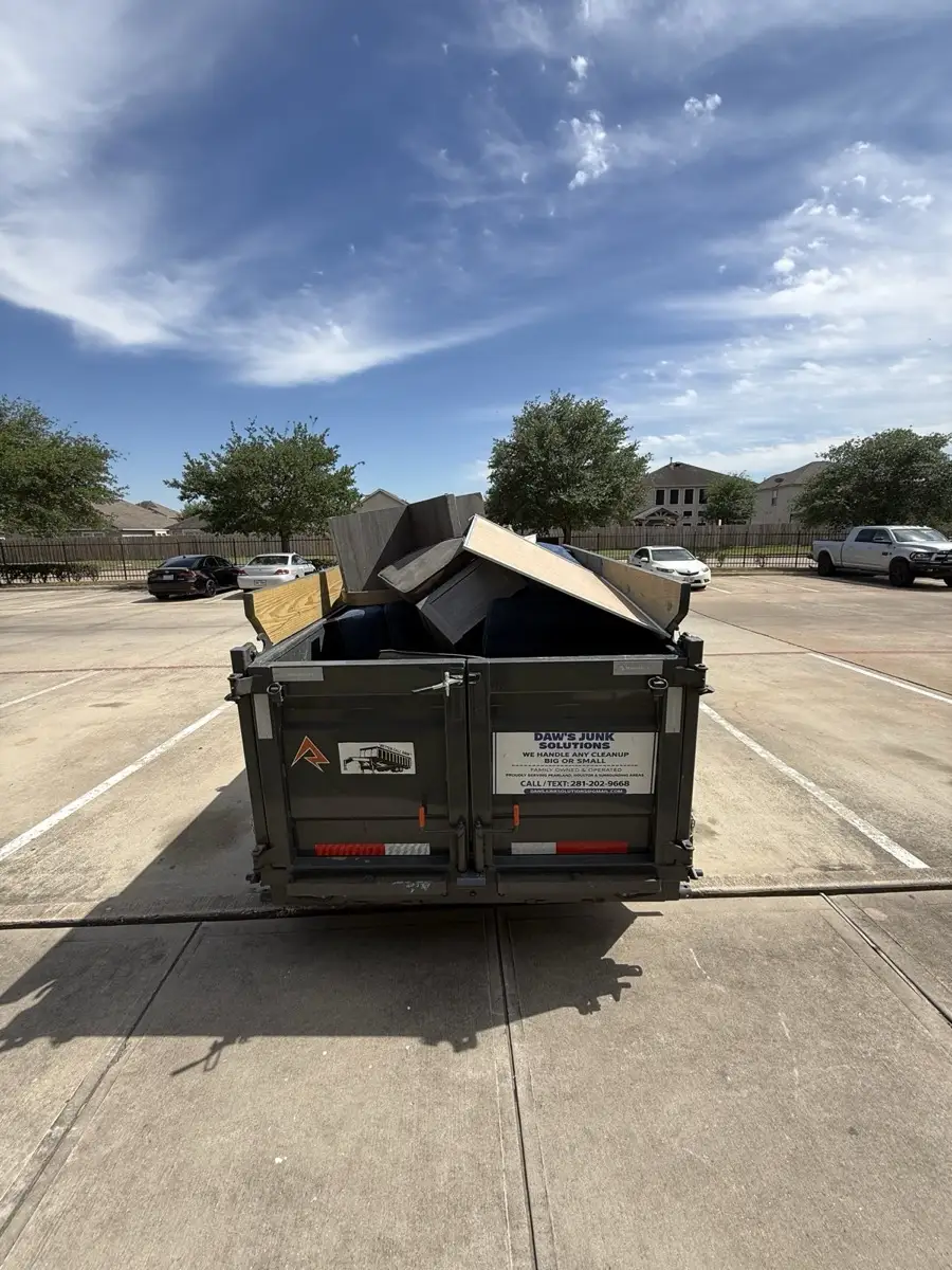 Commercial junk removal Pearland TX, Daw's trailer on job site